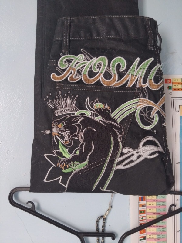 Vintage tiger design jeans for sale._1